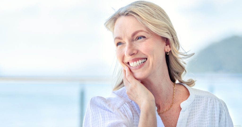 Mature woman smiling and posing for the camera (model)